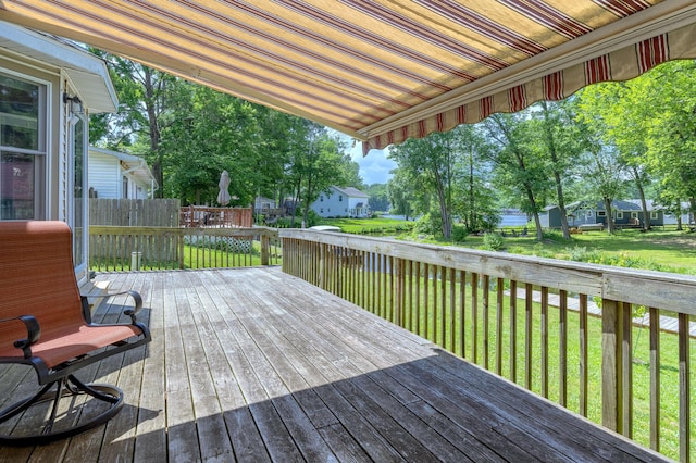 22770 Oak St, Pierson, MI 49339 - wooden terrace featuring a lawn and a residential view