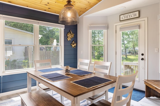 22770 Oak St, Pierson, MI 49339 - dining area featuring wood ceiling, vaulted ceiling, and wood finished floors