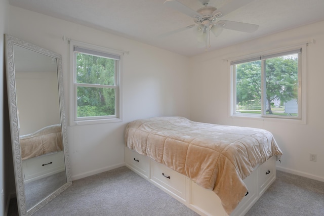 22770 Oak St, Pierson, MI 49339 - bedroom featuring light carpet and a ceiling fan