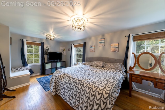 31718 W Chicago St, Canton, MI 48150 - bedroom featuring hardwood / wood-style flooring and a chandelier