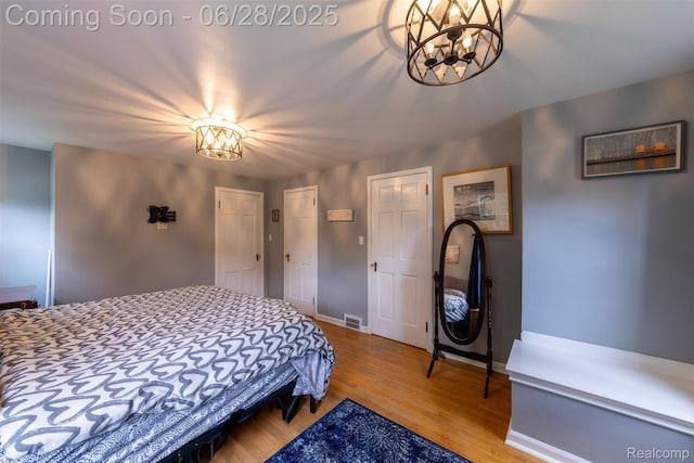 31718 W Chicago St, Canton, MI 48150 - bedroom with a chandelier and wood finished floors
