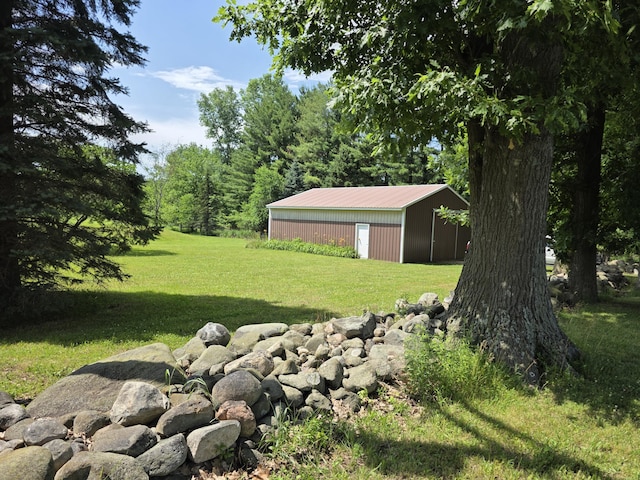 1236 Klink Rd, Tekonsha, MI 49092 - view of green lawn with a pole building and an outbuilding