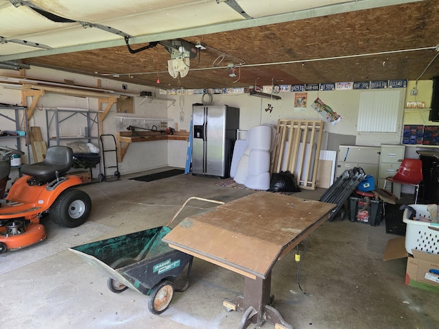 1236 Klink Rd, Tekonsha, MI 49092 - garage featuring stainless steel fridge with ice dispenser