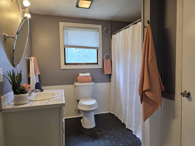 1236 Klink Rd, Tekonsha, MI 49092 - full bath with vanity, wainscoting, and curtained shower