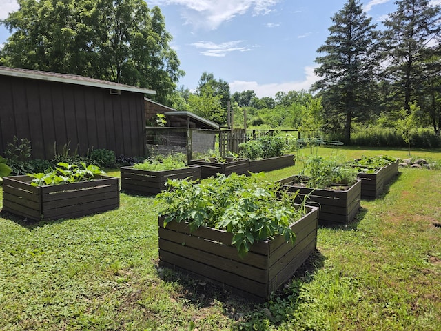 1236 Klink Rd, Tekonsha, MI 49092 - view of green lawn featuring a vegetable garden