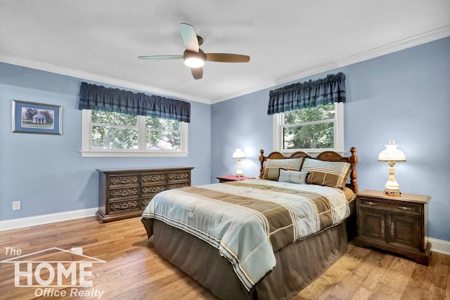 2367 Meadowdown Dr, Owosso, MI 48867 - bedroom featuring light wood-style floors, multiple windows, ornamental molding, and a ceiling fan
