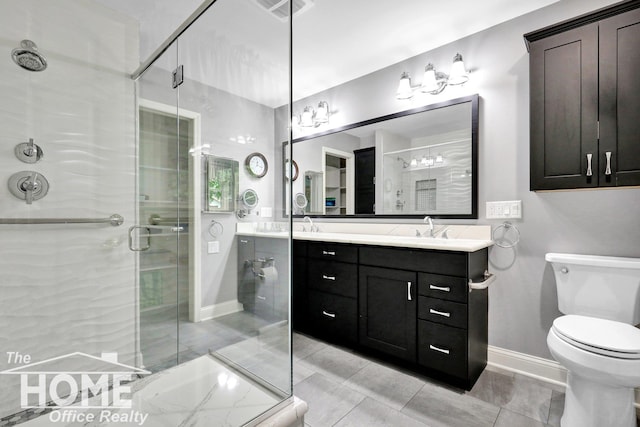 2367 Meadowdown Dr, Owosso, MI 48867 - bathroom featuring double vanity, a stall shower, and tile patterned floors