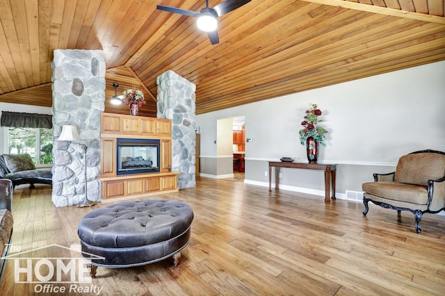 2367 Meadowdown Dr, Owosso, MI 48867 - living area featuring wood ceiling, lofted ceiling, a ceiling fan, and wood finished floors