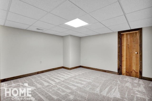 2367 Meadowdown Dr, Owosso, MI 48867 - carpeted empty room with a drop ceiling and baseboards