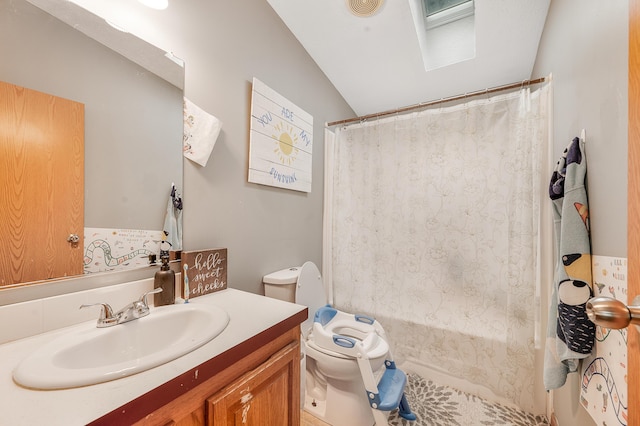 733 N Main St, Evart, MI 49631 - bathroom featuring vanity, vaulted ceiling, and shower / tub combo with curtain