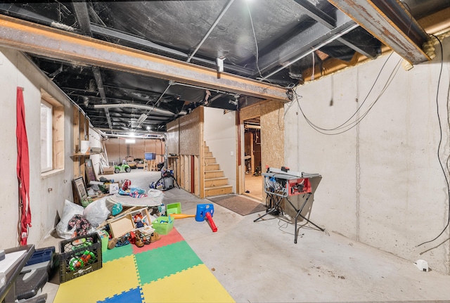 733 N Main St, Evart, MI 49631 - unfinished below grade area with stairs