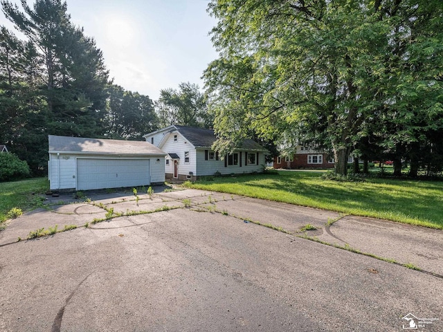 3375 Clinton Way, Jackson, MI 49201 - view of front of home featuring a front yard and an outdoor structure
