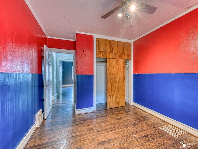 3375 Clinton Way, Jackson, MI 49201 - unfurnished bedroom featuring wood finished floors, ornamental molding, and a closet