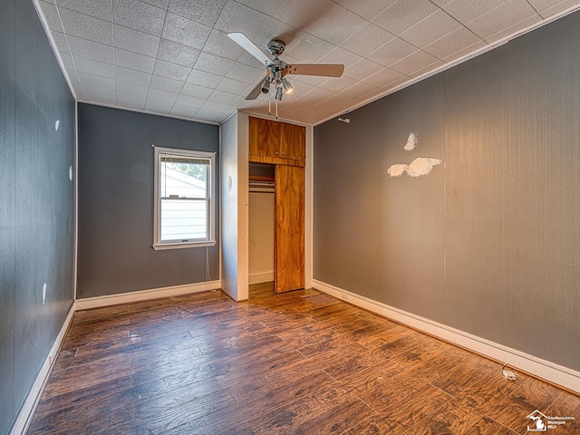 3375 Clinton Way, Jackson, MI 49201 - unfurnished bedroom with wood finished floors, a closet, ornamental molding, and ceiling fan