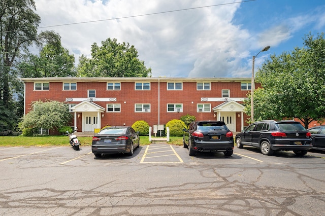 2002 N US Highway 31 Unit 8, Niles, MI 49120 - townhome / multi-family property with uncovered parking and brick siding