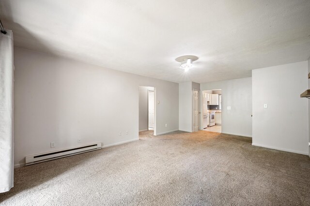 2002 N US Highway 31 Unit 8, Niles, MI 49120 - unfurnished room featuring a baseboard radiator and light colored carpet