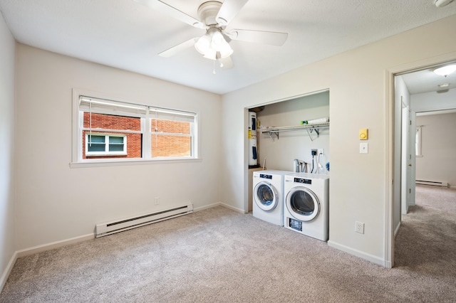 2002 N US Highway 31 Unit 8, Niles, MI 49120 - laundry area with a baseboard radiator, washer and clothes dryer, carpet flooring, and a ceiling fan