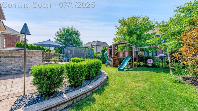 19492 Springbrook Dr, Macomb, MI 48044 - view of yard with a playground and a trampoline