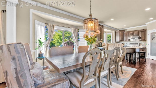 19492 Springbrook Dr, Macomb, MI 48044 - dining space with a chandelier, dark wood-style flooring, recessed lighting, and ornamental molding