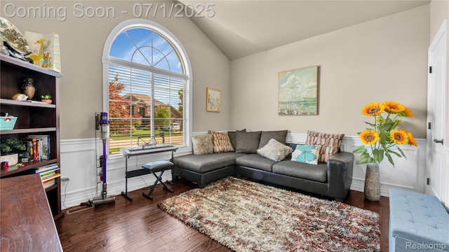 19492 Springbrook Dr, Macomb, MI 48044 - living room with a wainscoted wall, wood finished floors, and lofted ceiling