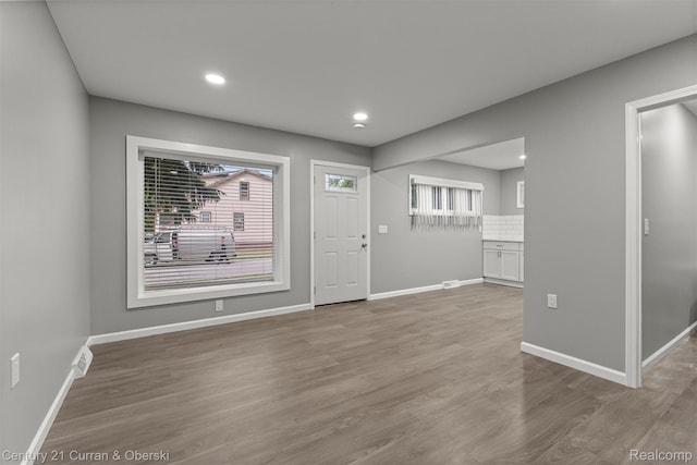 1587 Reo Ave, Lincoln Park, MI 48146 - entrance foyer with wood finished floors and recessed lighting