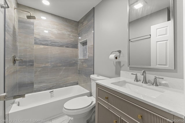 1587 Reo Ave, Lincoln Park, MI 48146 - bathroom featuring vanity, tub / shower combination, and marble look tile flooring