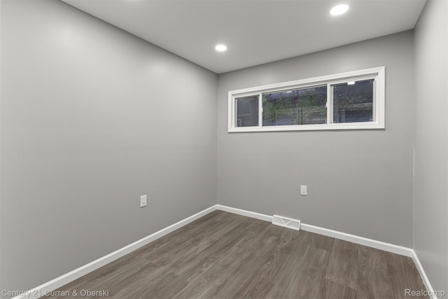 1587 Reo Ave, Lincoln Park, MI 48146 - spare room with wood finished floors and recessed lighting