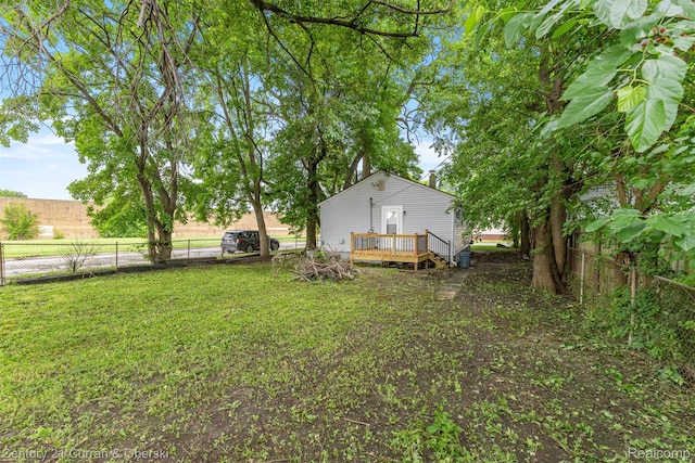 1587 Reo Ave, Lincoln Park, MI 48146 - view of yard featuring a deck