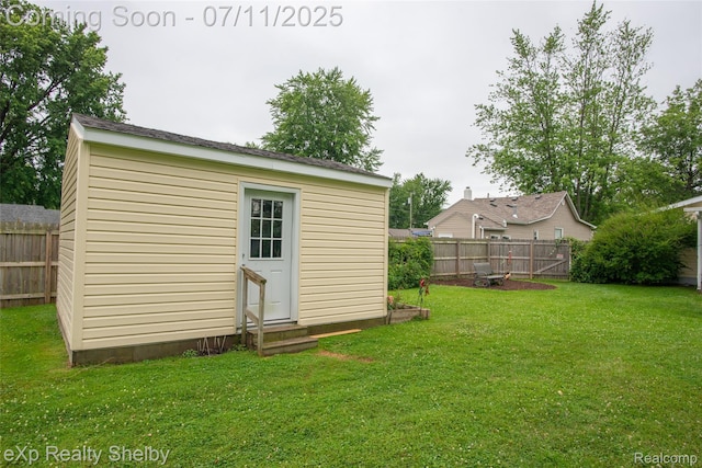 9595 Pearl Beach Blvd, Clay, MI 48001 - view of outbuilding with entry steps and a fenced backyard