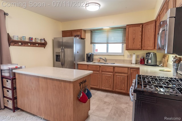 9595 Pearl Beach Blvd, Clay, MI 48001 - kitchen with stainless steel appliances, light countertops, brown cabinetry, a kitchen island, and light tile patterned floors