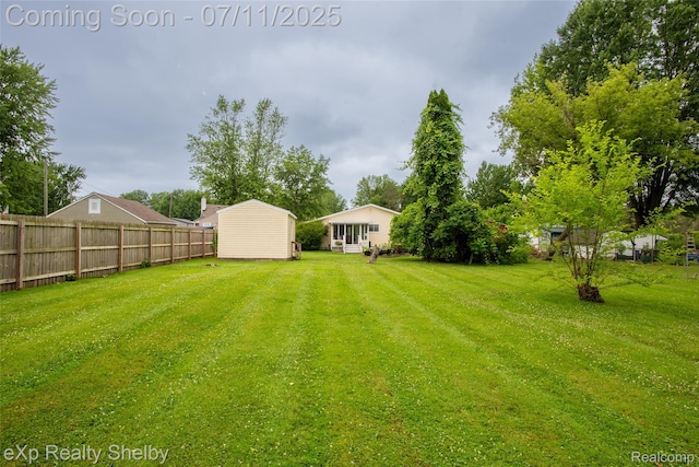 9595 Pearl Beach Blvd, Clay, MI 48001 - view of yard featuring a storage shed
