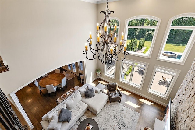 1988 Christenbury Ct, Rochester, MI 48306 - living room featuring a towering ceiling, a chandelier, and wood finished floors
