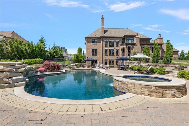 1988 Christenbury Ct, Rochester, MI 48306 - view of pool featuring a patio area and a pool with connected hot tub