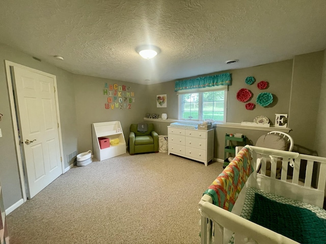 3643 Waterway Ct, Grass Lake, MI 49240 - carpeted bedroom featuring a textured ceiling and a nursery area