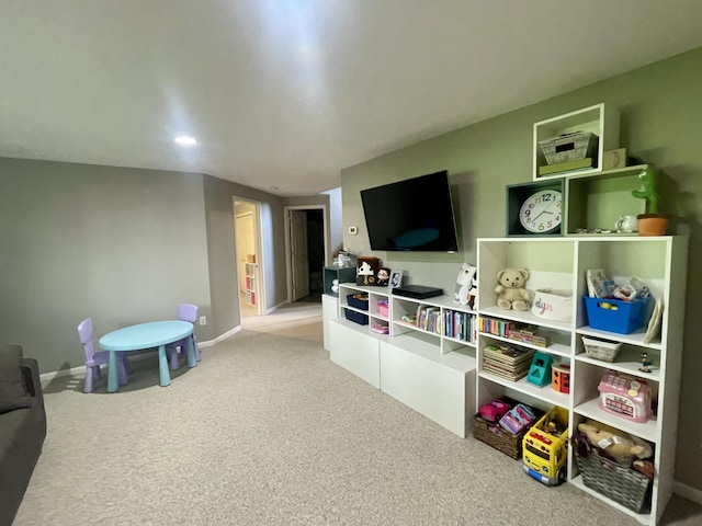 3643 Waterway Ct, Grass Lake, MI 49240 - game room with light carpet and baseboards