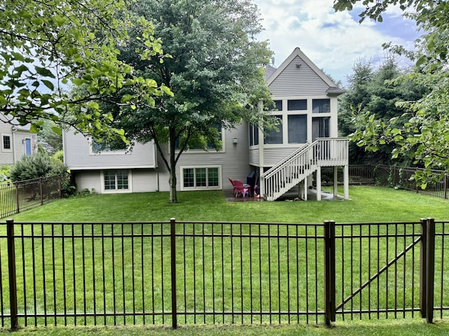 3643 Waterway Ct, Grass Lake, MI 49240 - rear view of property featuring a sunroom and a fenced backyard