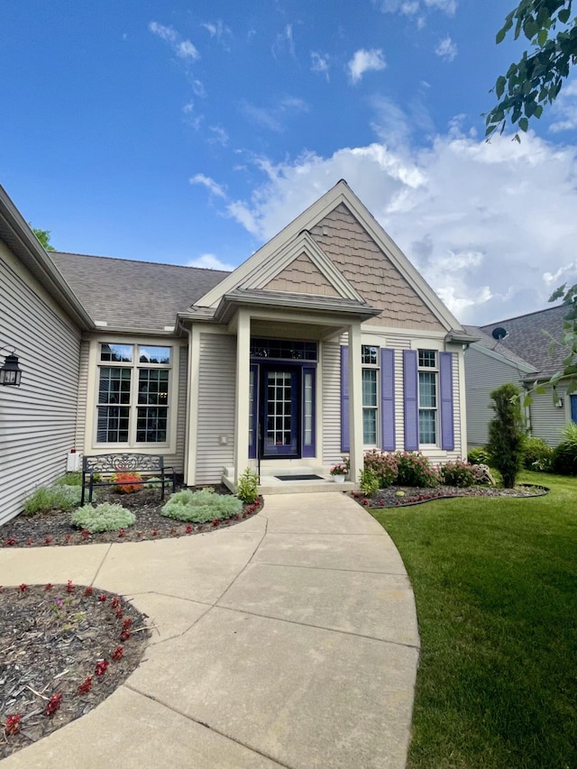 3643 Waterway Ct, Grass Lake, MI 49240 - view of front of house featuring a front lawn