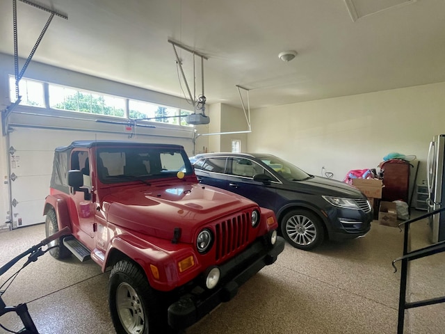 3643 Waterway Ct, Grass Lake, MI 49240 - garage featuring a garage door opener