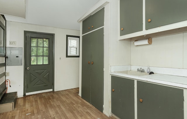 7125 Edwards Rd, Michigan, MI 48111 - kitchen with wood finished floors, light countertops, and green cabinets