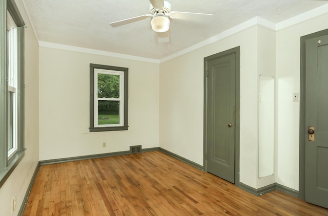7125 Edwards Rd, Michigan, MI 48111 - empty room with wood finished floors, ceiling fan, and crown molding