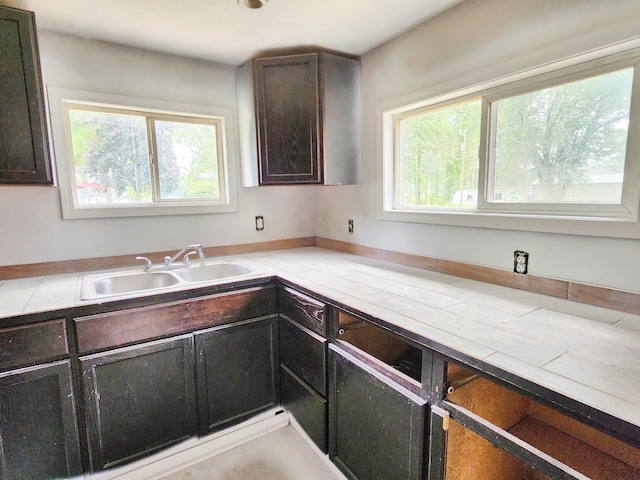 730 W Mohawk Trl, White Cloud, MI 49349 - kitchen with healthy amount of natural light and light countertops