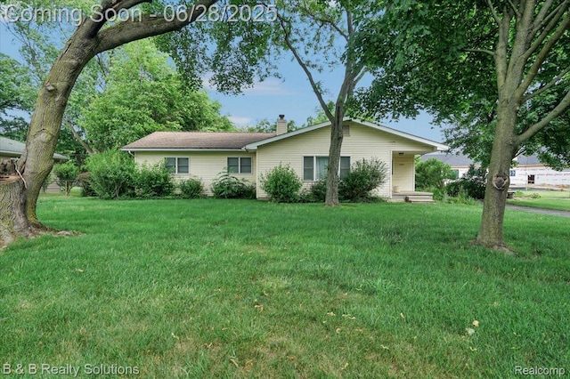 3423 Nichols Rd, Auburn Hills, MI 48326 - single story home with a chimney and a front lawn
