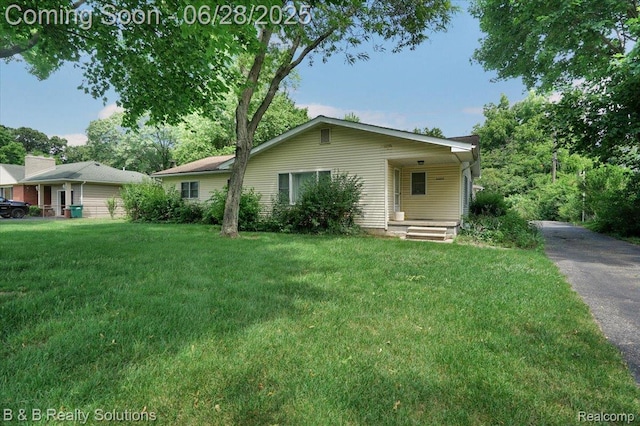 3423 Nichols Rd, Auburn Hills, MI 48326 - view of front facade with a front yard