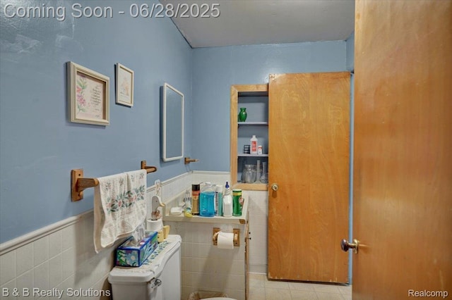 3423 Nichols Rd, Auburn Hills, MI 48326 - bathroom with wainscoting, tile patterned floors, and tile walls