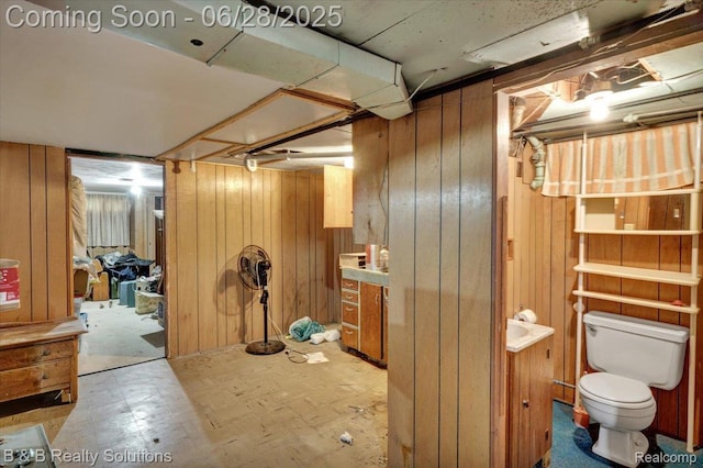 3423 Nichols Rd, Auburn Hills, MI 48326 - basement featuring wood walls and light floors
