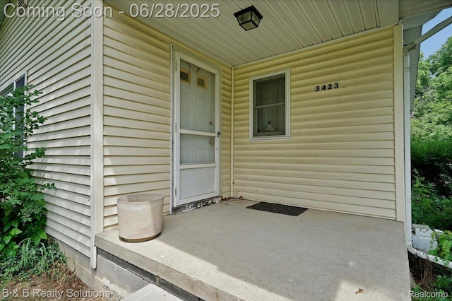 3423 Nichols Rd, Auburn Hills, MI 48326 - property entrance with a patio area