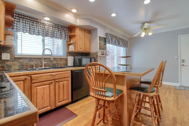 13947 Ashurst St, Livonia, MI 48154 - kitchen featuring open shelves, dishwasher, black microwave, a breakfast bar, and decorative backsplash
