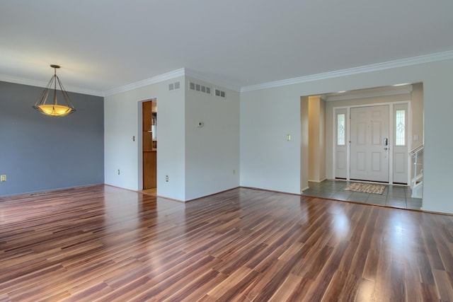 13947 Ashurst St, Livonia, MI 48154 - unfurnished living room with wood finished floors and ornamental molding