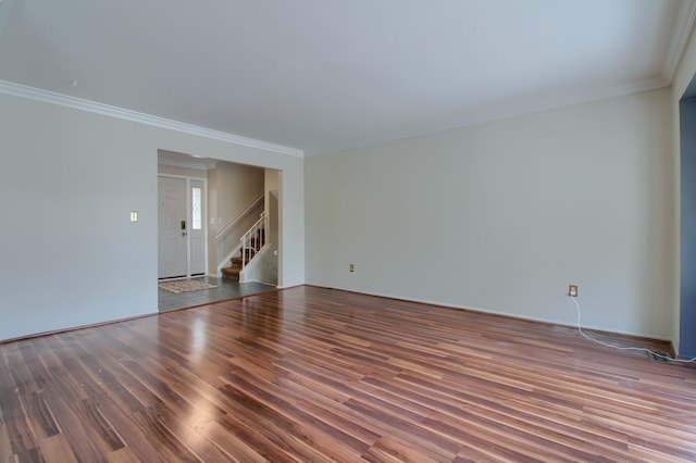 13947 Ashurst St, Livonia, MI 48154 - unfurnished room with wood finished floors, stairway, and ornamental molding