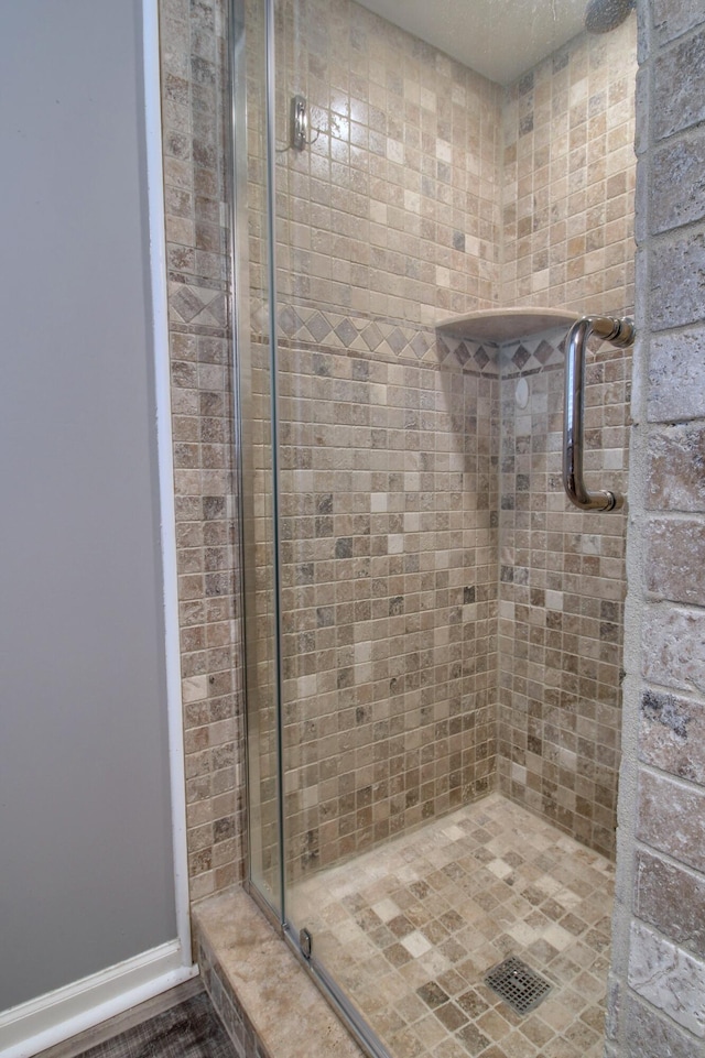 13947 Ashurst St, Livonia, MI 48154 - full bath with a stall shower and baseboards